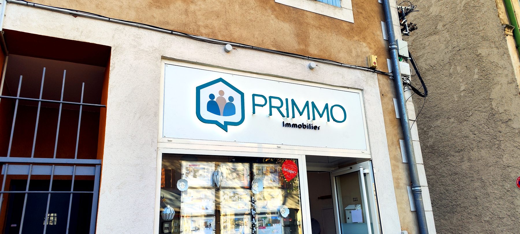 Enseigne lumineuse — 045_adhesif-vitrine-primmo-immobilier